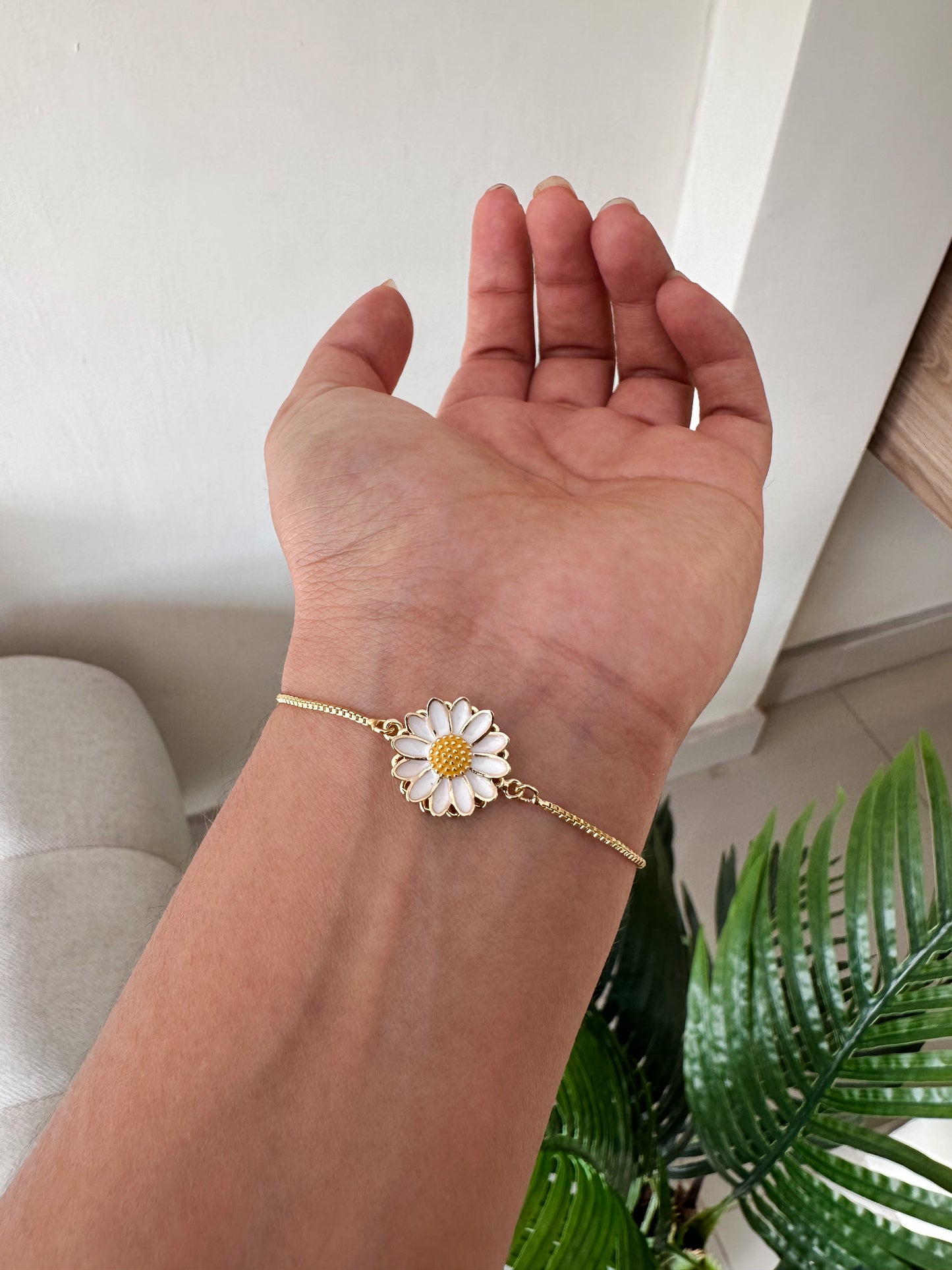 Pulsera margarita giratoria