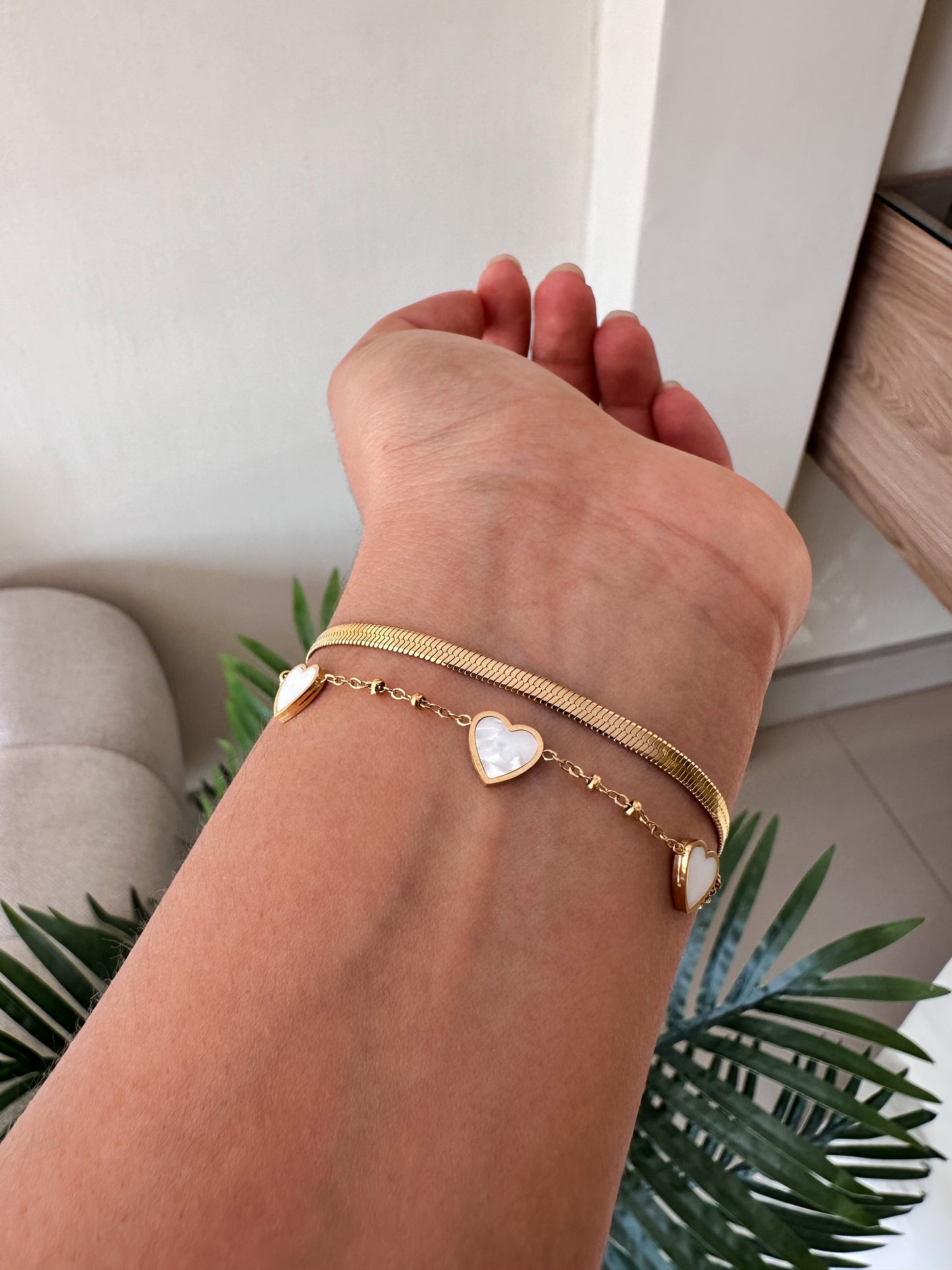 Pulseras dobles de corazones