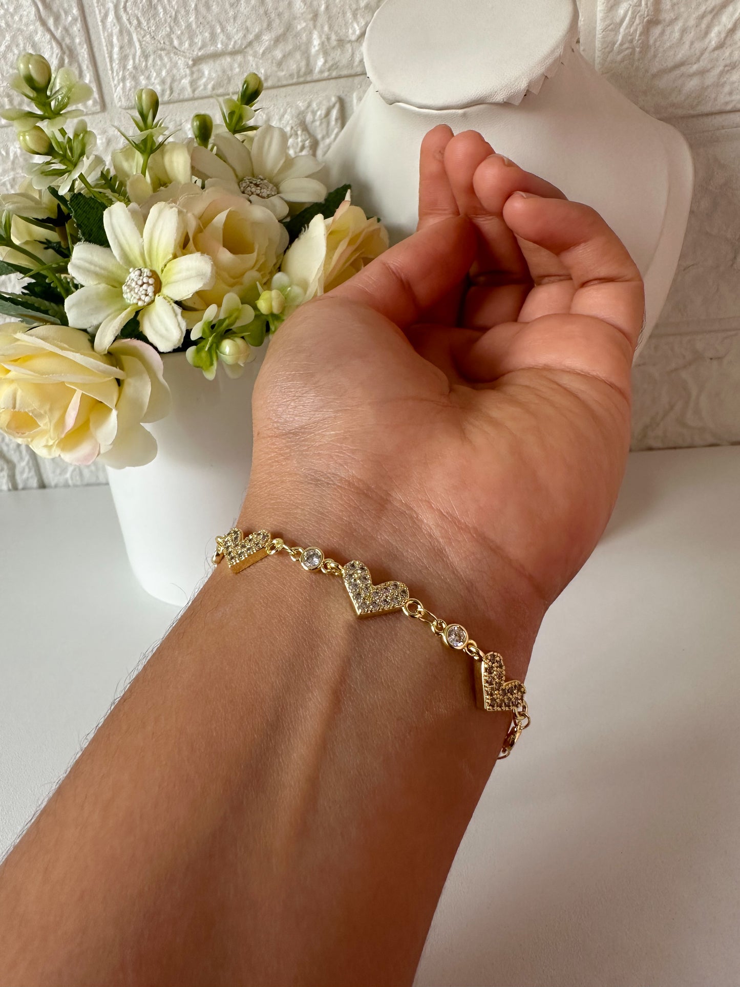 Pulsera corazones brillantes