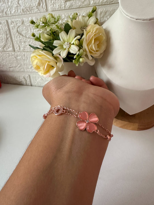 Pulserita flor oro rosa