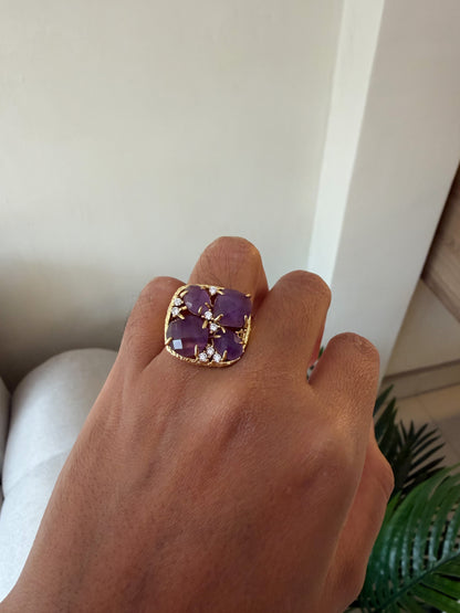 Anillo piedras púrpura