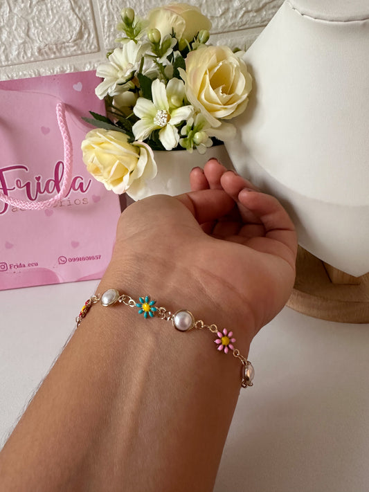 Pulserita flores y perlas