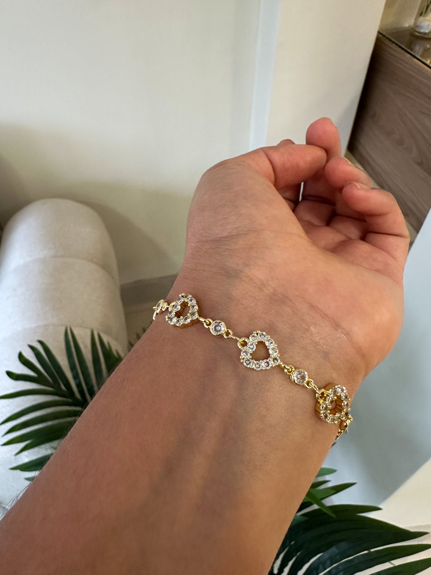 Pulserita corazones brillantes