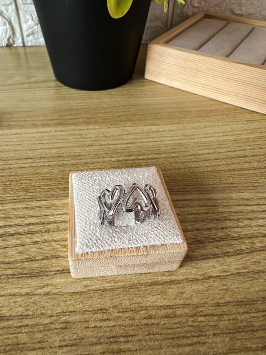 Anillo varios corazones plateado