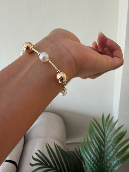 Pulsera balines y perlas